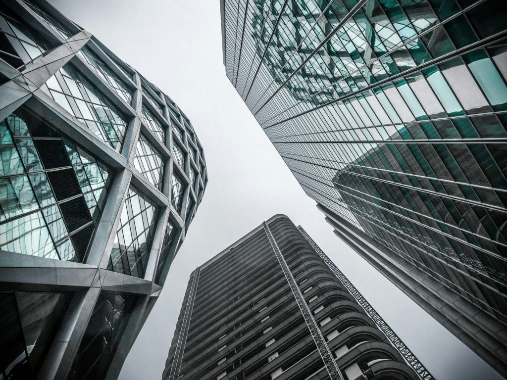 low angle photography of highrise buildings